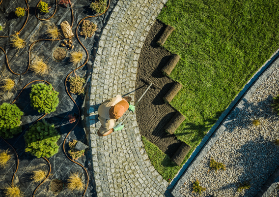 Overhead View of Person Laying Sod